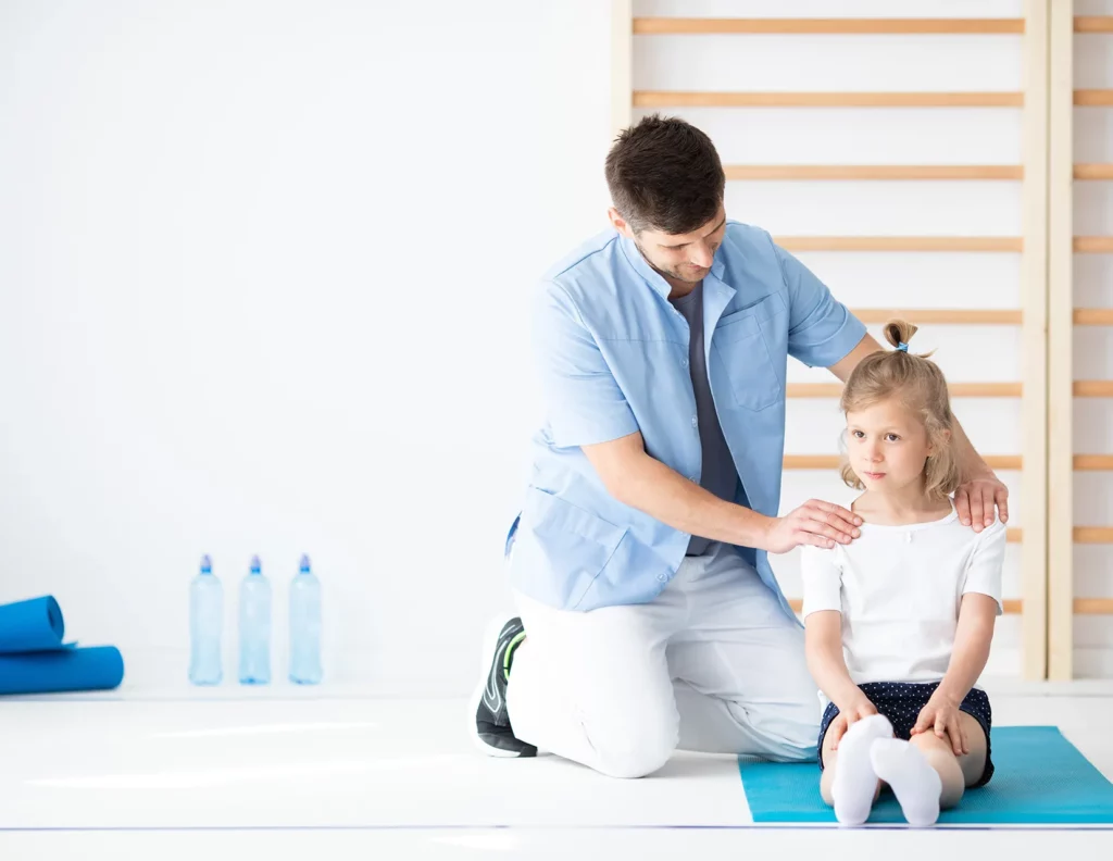 Back to sports 4 cute school girl sitting on blue yoga mat talking 2023 11 27 05 08 16 utc e1708444213448
